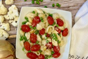 Pasta with Cauliflower Alfredo, Peas and Tomatoes